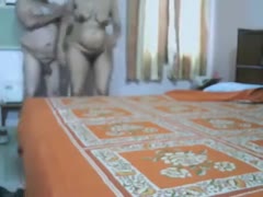 An obese Indian woman is prepared to have sex with her husband.